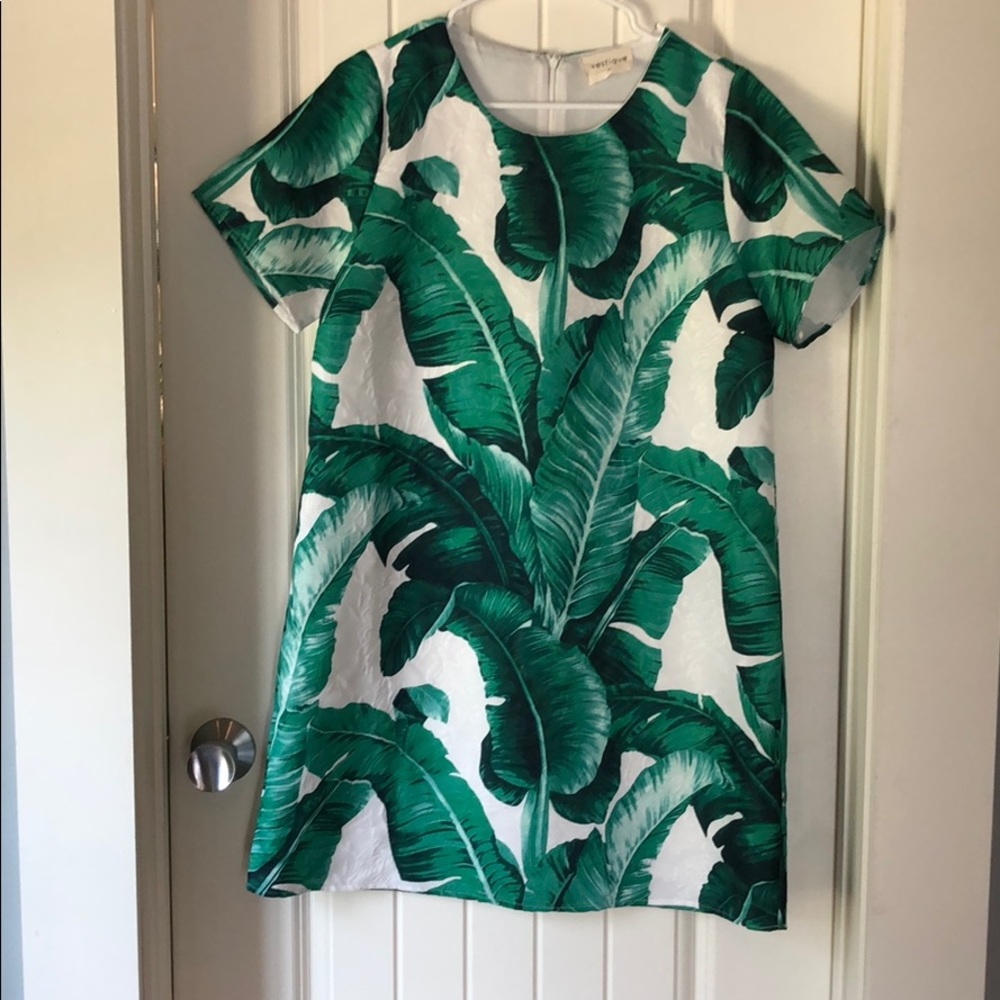 Green and white floral mini dress